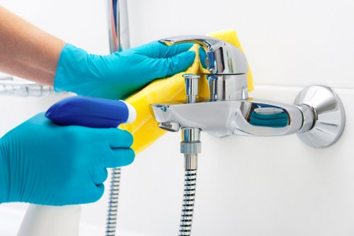 Cleaners preparing equipment with safety focus